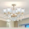 Đèn chùm trang trí cao cấp, kết hợp pha lê lấp lánh và chi tiết kim loại tinh xảo, mang lại vẻ đẹp hiện đại và sang trọng cho phòng khách, biệt thự hay sảnh lớn