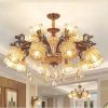Đèn chùm trang trí cao cấp, kết hợp pha lê lấp lánh và chi tiết kim loại tinh xảo, mang lại vẻ đẹp hiện đại và sang trọng cho phòng khách, biệt thự hay sảnh lớn