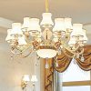 Đèn chùm trang trí cao cấp, kết hợp pha lê lấp lánh và chi tiết kim loại tinh xảo, mang lại vẻ đẹp hiện đại và sang trọng cho phòng khách, biệt thự hay sảnh lớn