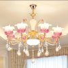 Đèn chùm trang trí cao cấp, kết hợp pha lê lấp lánh và chi tiết kim loại tinh xảo, mang lại vẻ đẹp hiện đại và sang trọng cho phòng khách, biệt thự hay sảnh lớn