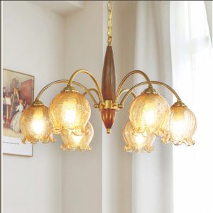 Đèn chùm trang trí cao cấp, kết hợp pha lê lấp lánh và chi tiết kim loại tinh xảo, mang lại vẻ đẹp hiện đại và sang trọng cho phòng khách, biệt thự hay sảnh lớn