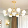 Đèn chùm trang trí cao cấp, kết hợp pha lê lấp lánh và chi tiết kim loại tinh xảo, mang lại vẻ đẹp hiện đại và sang trọng cho phòng khách, biệt thự hay sảnh lớn