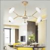 Đèn chùm trang trí cao cấp, kết hợp pha lê lấp lánh và chi tiết kim loại tinh xảo, mang lại vẻ đẹp hiện đại và sang trọng cho phòng khách, biệt thự hay sảnh lớn