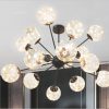 Đèn chùm trang trí cao cấp, kết hợp pha lê lấp lánh và chi tiết kim loại tinh xảo, mang lại vẻ đẹp hiện đại và sang trọng cho phòng khách, biệt thự hay sảnh lớn